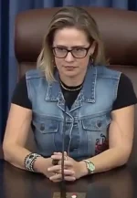 kyrsten sinema blue vest