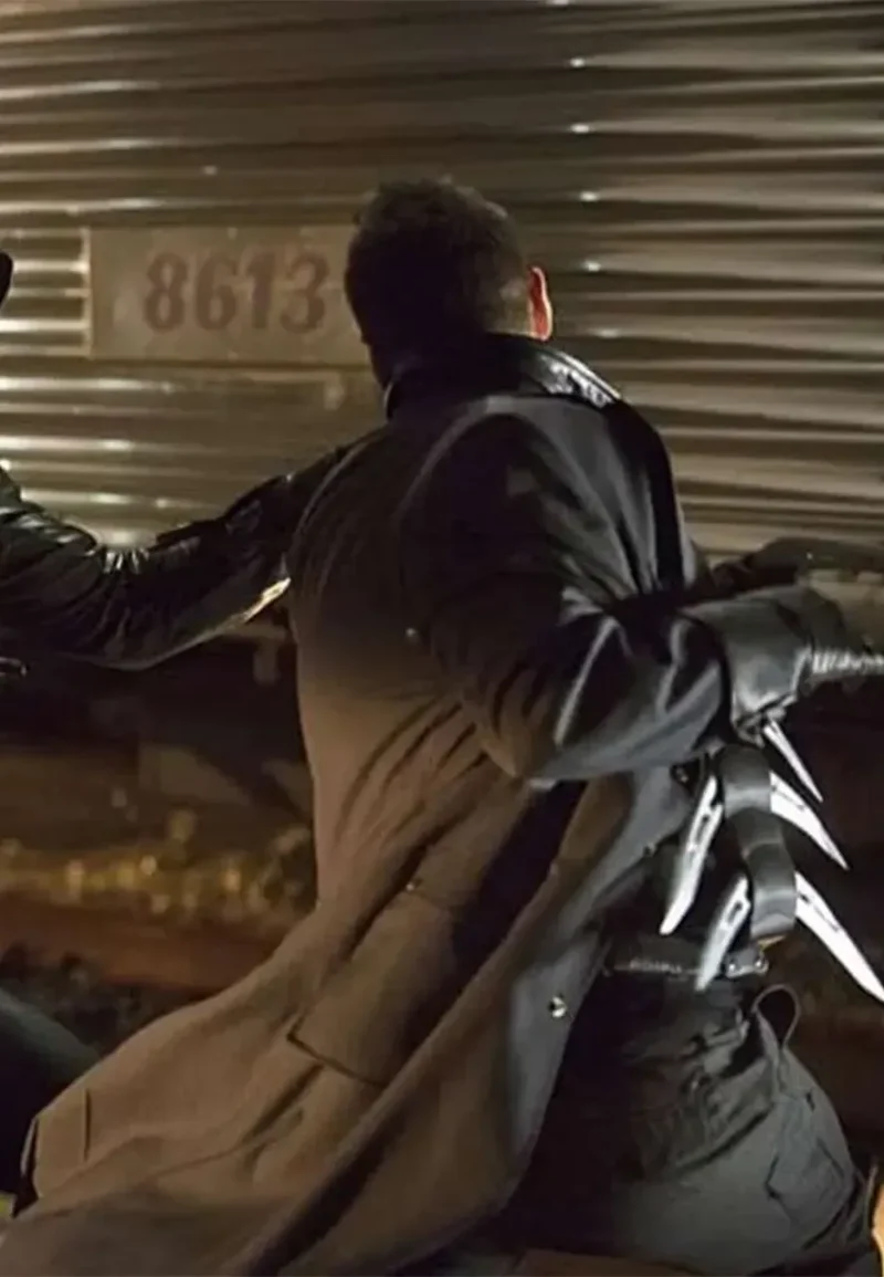 nick e tarabay black coat