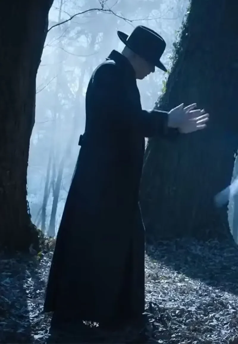 uncle fester wednesday fred armisen black coat